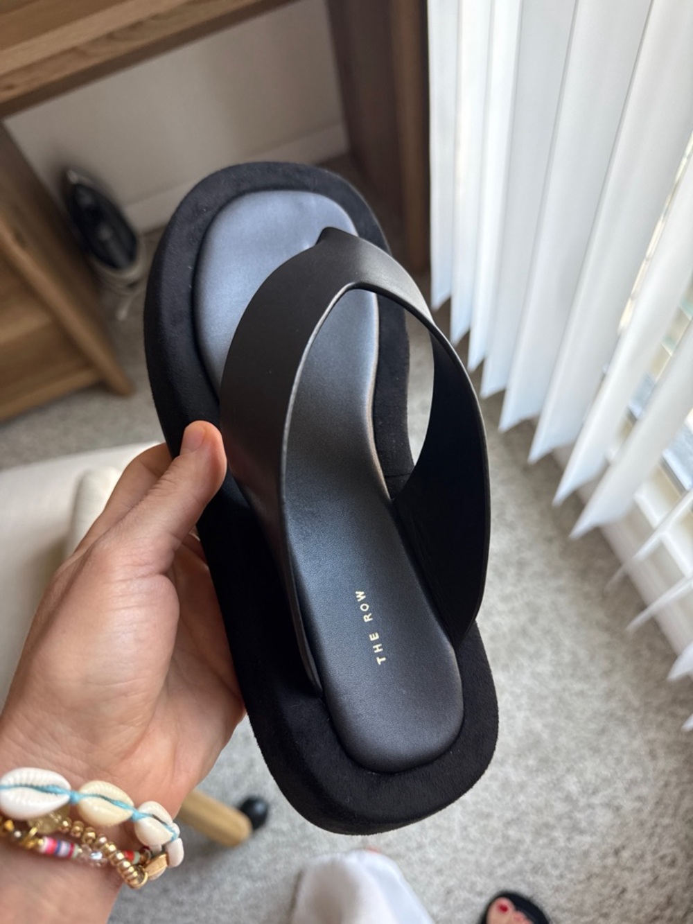 The Row black leather platform thong sandal